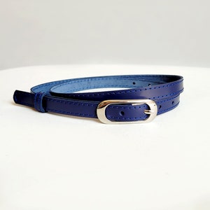 Navy leather belt for women. Natural leather skinny belt with oval buckle