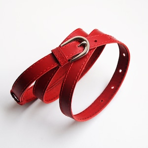 Red natural leather waist belt for woman&#39;s. Silver, gold, dark metal buckle