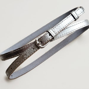 Silver leather belt, made of natural pebbled leather. Women&#39;s waist belt