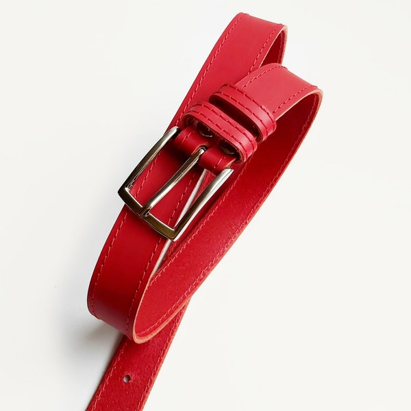 Red genuine leather belt with silver color buckle. Handmade leather belt