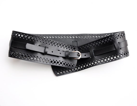 black belt with holes all around