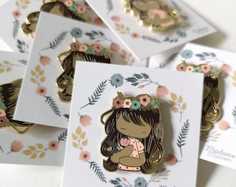 Pin's "Jeune fille aux fleurs"