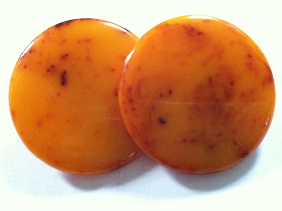 Mid Century Modern Orange Amber Bakelite Clip ons… - image 1