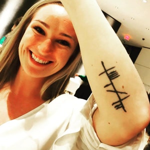 Presentatie Ogham-tatoeage