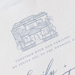 May include: A light blue and white wedding invitation with a detailed illustration of a house and palm trees. The text reads "Together with our families, we invite you to the wedding of Emily + Trevor."