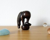 Wood carved horse. Vintage wood netsuke from the 1970s