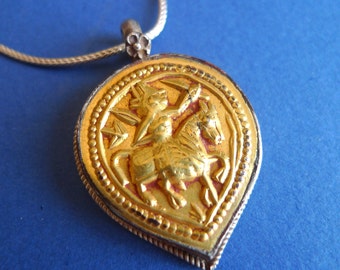 Gold Foil Silver Pendant,  depicting Revanta