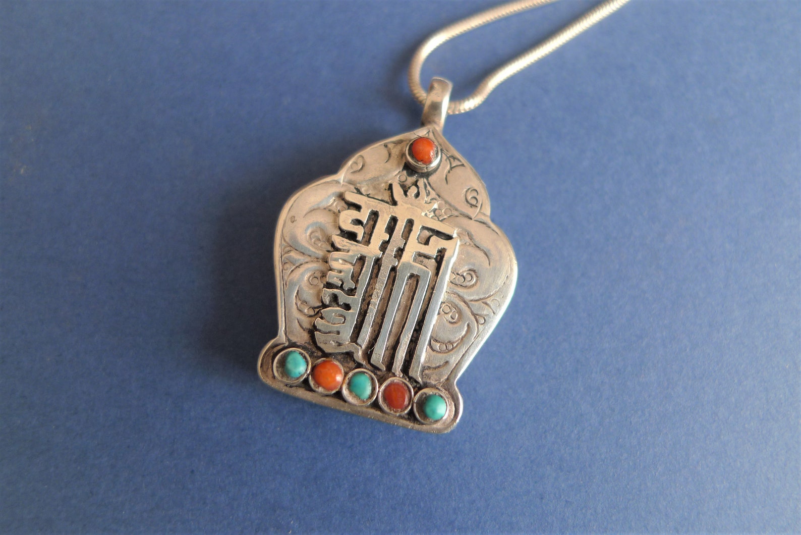 Buddhist silver charm Etsy