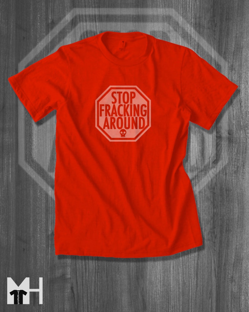 May include: Red t-shirt with a white stop sign graphic that says "Stop Fracking Around".