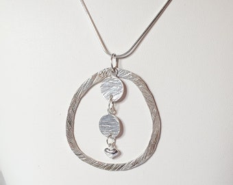 Sterling Silver Heart Necklace: Textured Circle Pendant, 20 inch Chain