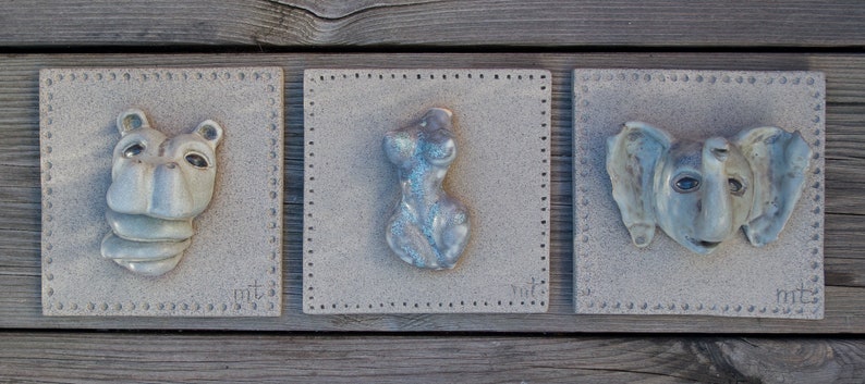 Portrait of a baby Hippo on a ceramic tile