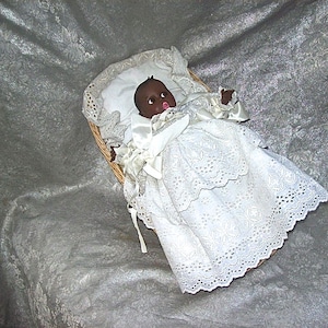 Circa 1970&#39;s GERBER AFRO-AMERICAN Vinyl Baby Doll with Flirty Eyes in Wicker Basket Bed