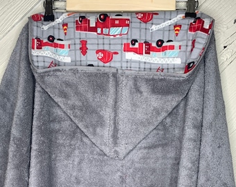 Hooded towel or hooded poncho towel with fire trucks