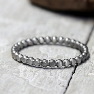 Silver ring stacking ring Small discs No. 84, blackened, 925 sterling Silver, slightly wavy shape