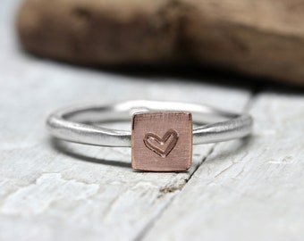 Stacking ring with heart, no. 127, ring made of 925 silver and 333 red gold, embossed with hearts, organic shape, love, Valentine's Day