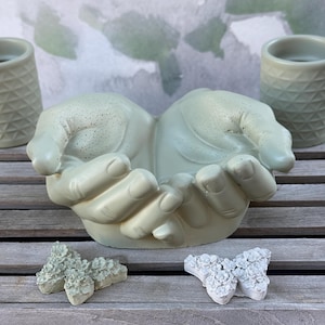 May include: A rustic wooden sign with the text "Welcome to our home" in white lettering. The sign features a distressed finish and a simple, inviting design, perfect for entryway decor.