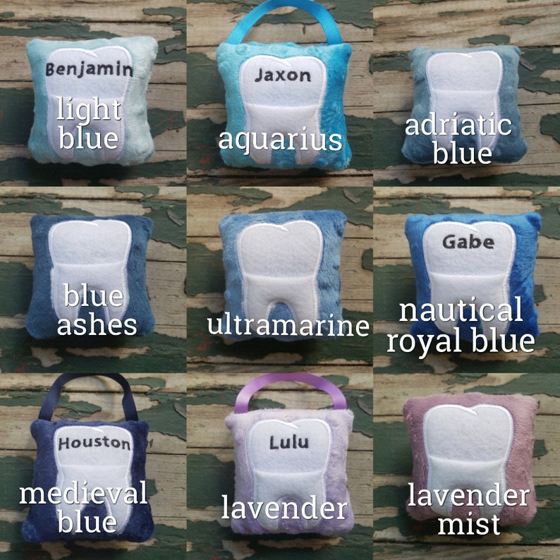May include: Nine plush tooth-shaped cushions in various colours, including light blue, blue, ultramarine, royal blue, lavender, and lavender mist. Each cushion has a different name embroidered on it, such as Benjamin, Jaxon, Gabe, Houston, and Lulu.