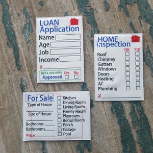 May include: Three white forms with red and blue accents. The first form is a loan application with fields for name, age, job, income, and bank approval. The second form is a home inspection checklist with items like roof, chimney, gutters, windows, doors, heating, AC, and plumbing. The third form is a for sale sign with fields for type of house, size of house, bedrooms, bathrooms, and price. Each form has a small house icon in the top right corner.