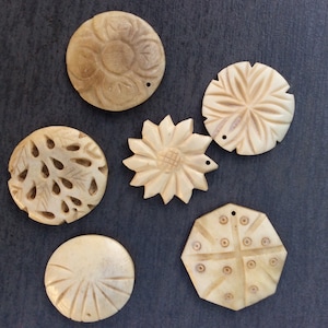Carved ox bone pendant. Bone pendant beads. Jewelry making .Ethnic pendant making. Irish supplier. Sold individually. 6 bovine bone designs