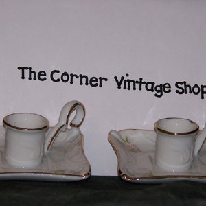 Light your way with this pair of China candle holders