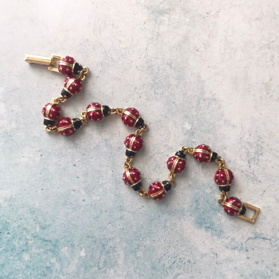 Vintage Joan Rivers Signed Gold Tone Red and Black