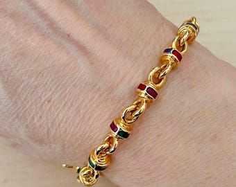 Pulsera vintage de eslabones esmaltados multicolor en tono dorado firmada por Joan Rivers. Joyas Joan Rivers. Pulsera Joan Rivers. Ideas de regalo de joyería vintage.
