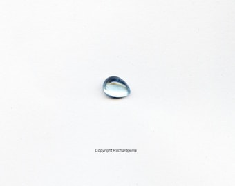 May include: A light blue teardrop-shaped gemstone on a white background.