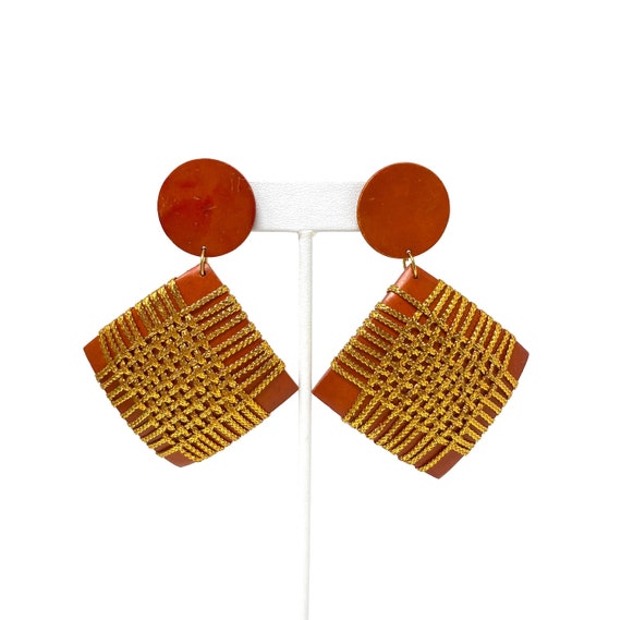 orange colored earrings 1980