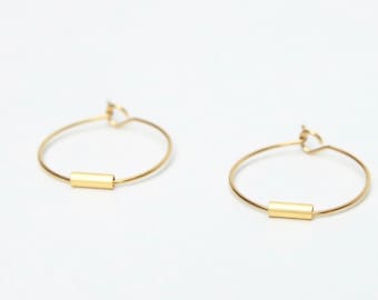 Mini hoop earrings in fine gold or golden stainless steel, minimalist design shape