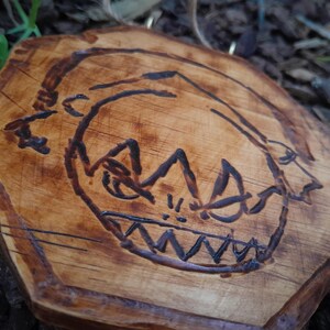 Angry Earth Girl Wooden Wall Hanging