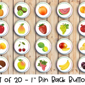 May include: Set of 20 1-inch pin back buttons featuring various fruits, including pineapple, watermelon, grapes, cherries, apples, and more.