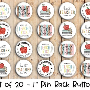 May include: Set of 20 1-inch pin back buttons with various teacher-themed designs. The designs include phrases like "Wake Up Teach Kids", "Blessed Teacher", "Best Teacher Ever", and "Teaching is a Work of Heart". Some designs feature a red apple and books.