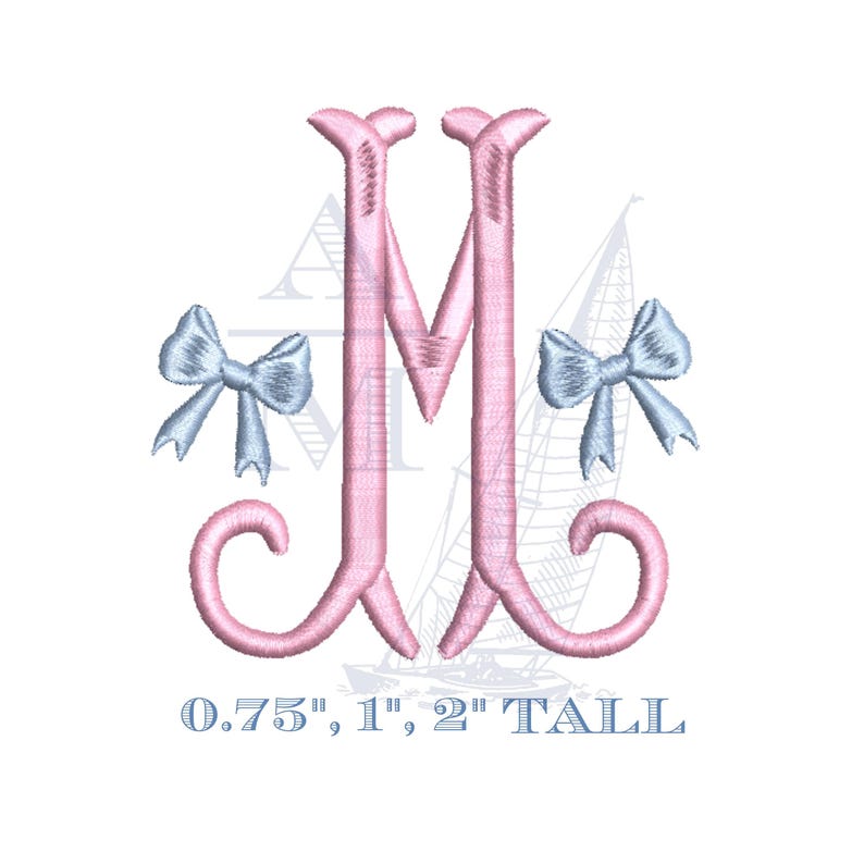 May include: A pink embroidered letter "M" with two light blue bows on either side. The letter has a decorative, cursive design. Text at the bottom reads "0.75", 1", 2" TALL".