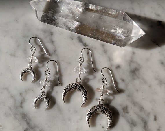 Tiny decorative crescent moons with herkimer diamonds on silver