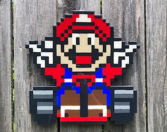 Handgemaakte Super Mario Kart-muurkunst: SNES Victory-harsafwerking