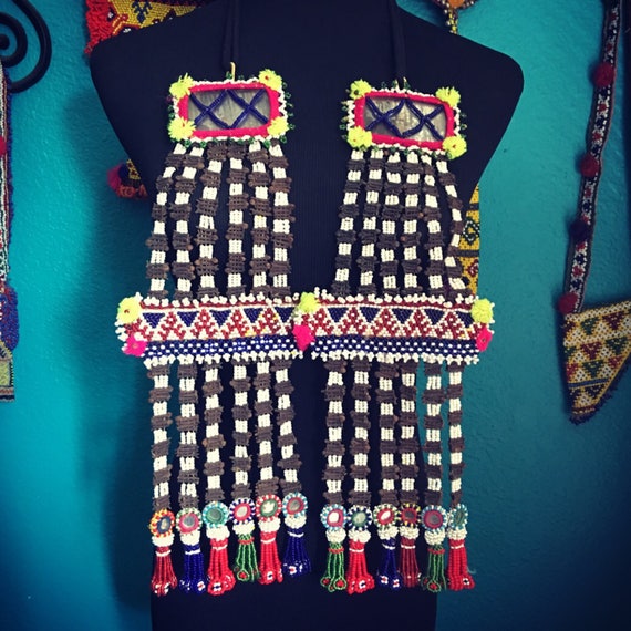 Beaded Kuchi tassels.