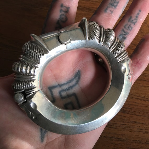 Hinged silver Makara bangle. - image 2