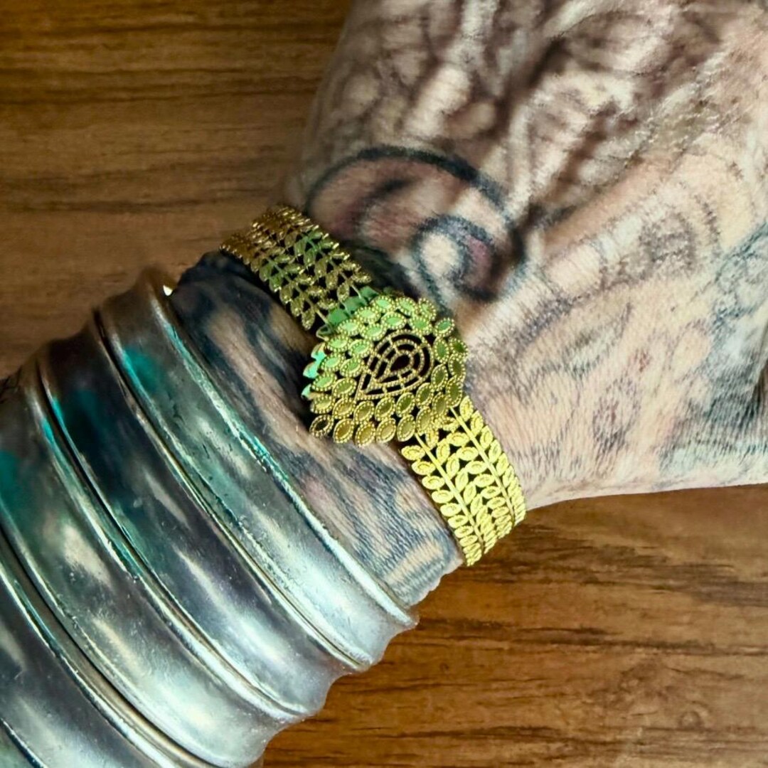 Spring Bangle Design Gold Toned “spring” Bangle. - Etsy