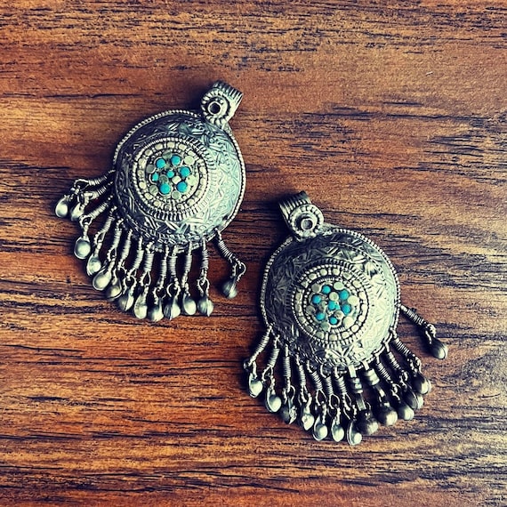Matched pair of Waziri pendants.