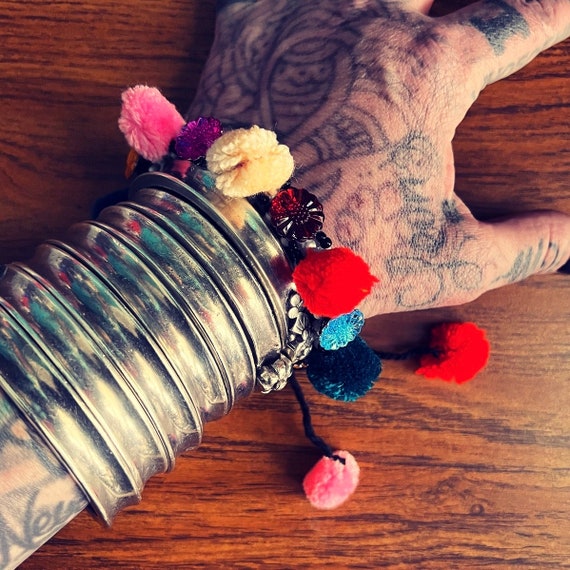 FLASH SALE. Woven bracelet with pom-poms. - image 1