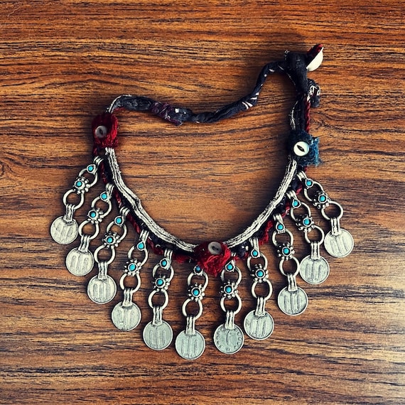 Kuchi "shoelace" necklace. (Well loved).