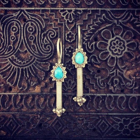 Silver Kuchi earrings.