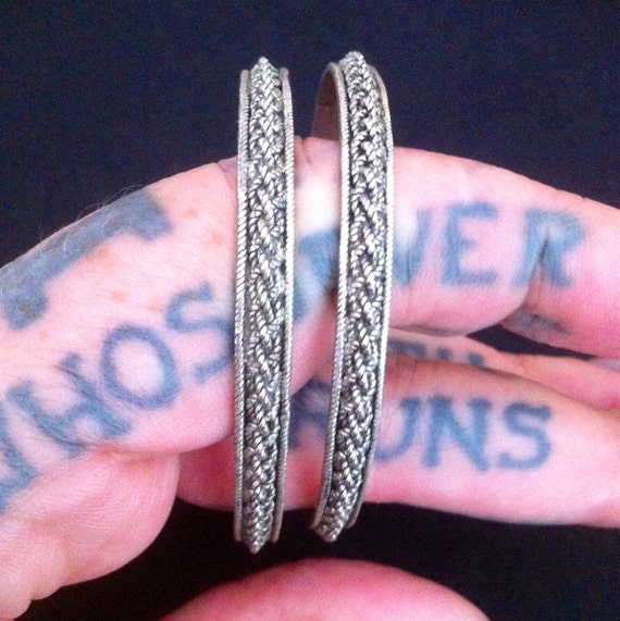 Pair of silver bangles from India.