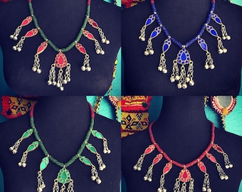 Reproduction mirror necklace.
