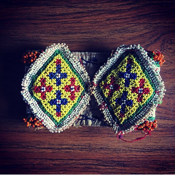 Beaded Kuchi component.