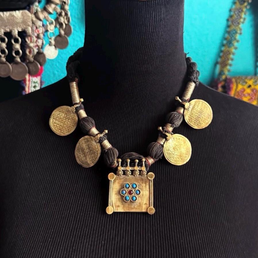 Kuchi “box" necklace with gold plate.