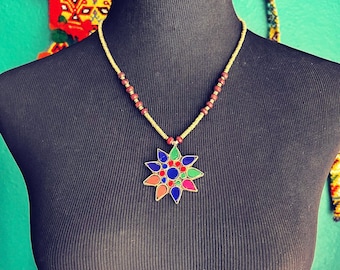 Chintzy boho flower necklace.