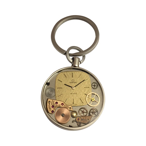 Porte clés avec cadran et pièces détachées de montre OMEGA