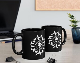 Theres Been a Murder Schwarze Tasse (11oz, 15oz)