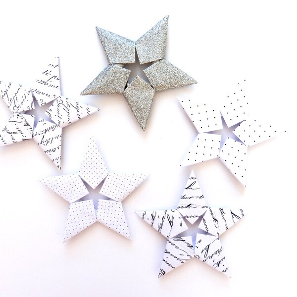 Etoiles origami en papier décoratives : blanc, noir, argent